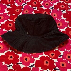 Helen Kaminski Black Oilcloth Bucket Hat w wool lining.